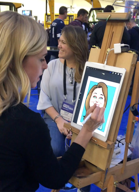 Foot traffic charicature artist working digitally on an iPad to produce live digital caricatures